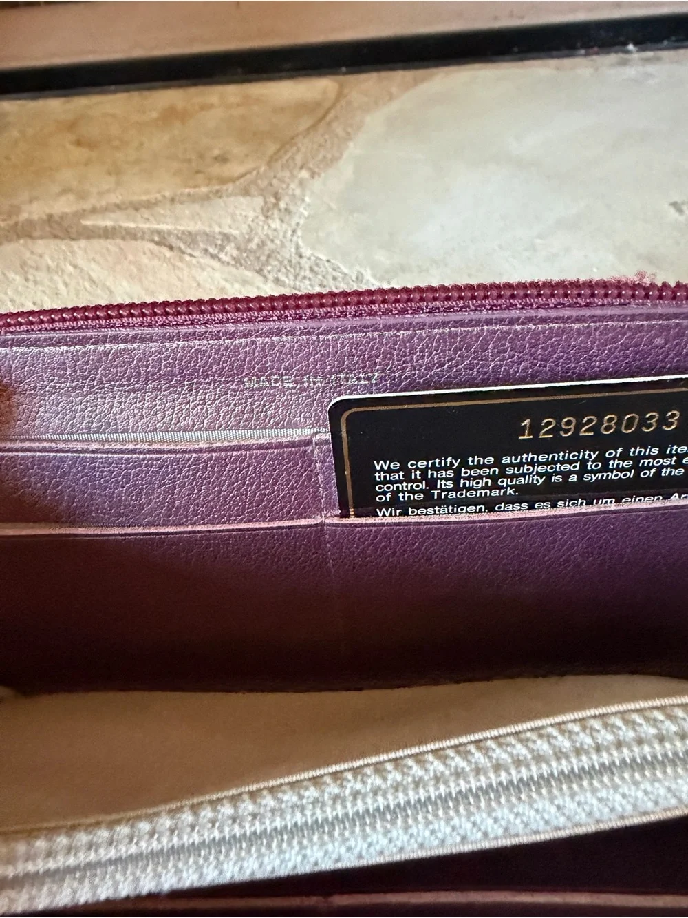 CHANEL Plum Camellia Zip Around Leather Wallet